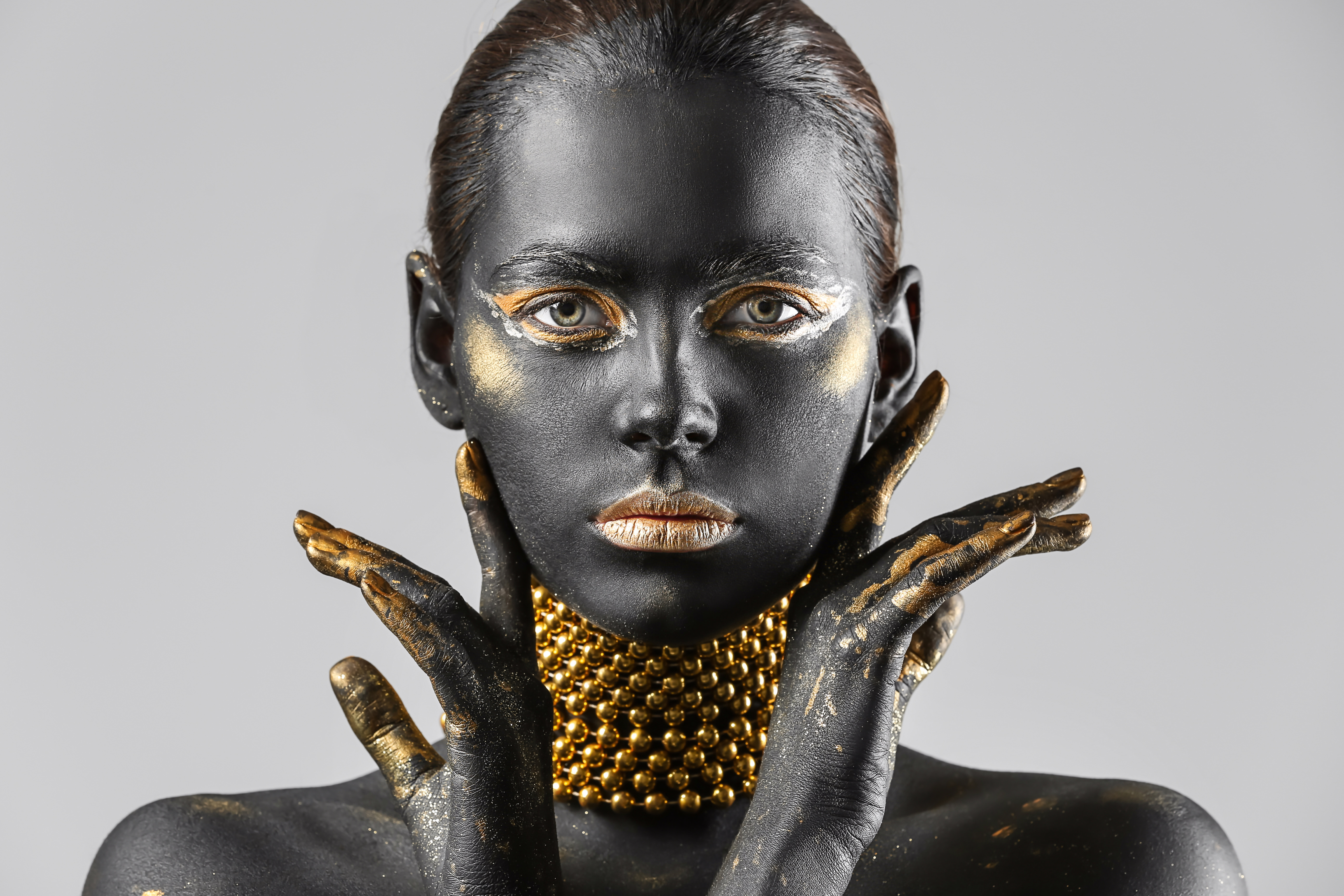 Opulent Glow: The Woman Adorned in Gold Makeup Wall Art